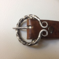 Hand forged belt buckle